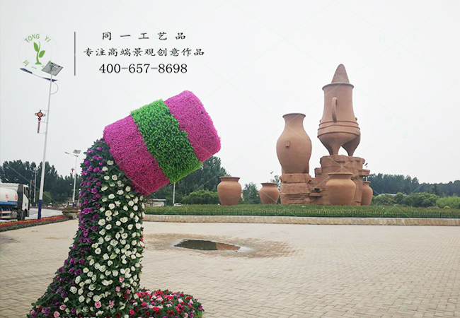 仿真綠雕花桶瀑布造型案例圖